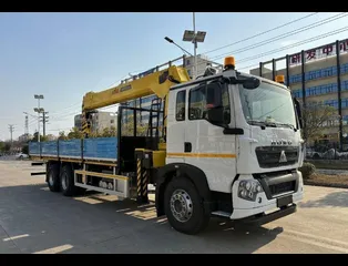 Бортовой Howo T5G 6x4 с КМУ HYVA