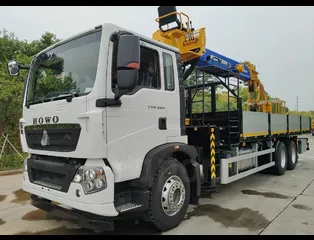 Бортовой Howo T5G 6x4 с КМУ JUNTON